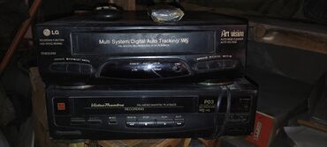 dvd плеер bbk dvp753hd black: Два видеомагнитофона: LG с функцией Multi System Digital Auto Tracking