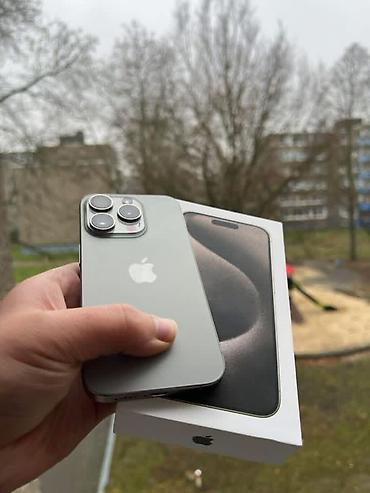 mac utu feni: IPhone 15 Pro, 128 GB, Natural Titanium, Face ID — 1