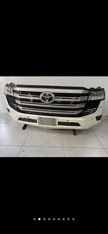 Бампер и комплектующие: Бампер Toyota, Оригинал — 32