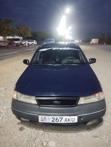 Daewoo Nexia, седан, темно-синий цвет. Кузов: - 4 двери, тонированные