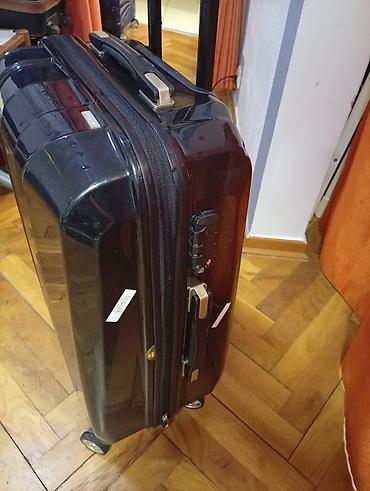 Putni koferi i torbe: Tvrdi kofer sa 4 točka, crne boje OKO. 65 40 25. MIRJEVO - — 3