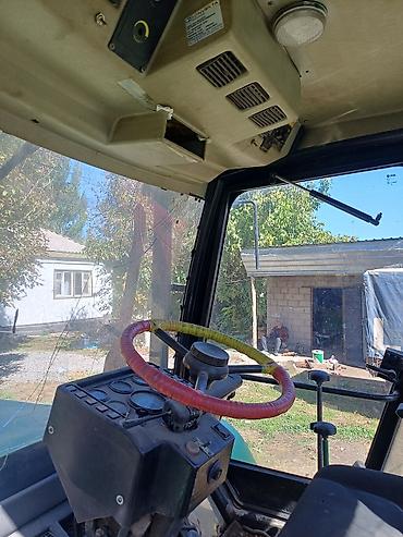 Другие тракторы: Колёсный трактор с кабиной Основные характеристики: - Полностью — 10