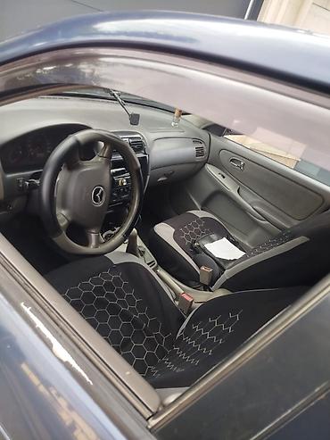 mazda 626 2002: Mazda 626: 2000 г., Механика, Бензин, Седан — 5