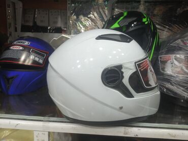 Moto dəbilqələr: 1-ci şəkildəki Baqaj 95 aznMoto Dəbilqələr Ag qarşı enli şüşəli 29azn — 27