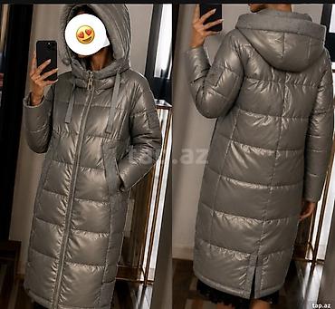 Qadınlar üçün uzun şişmə qış palto – boz/metalik rəngdə. - Model lalafo.az -da Qadınlar üçün uzun şişmə qış palto – boz/metalik rəngdə. - Model