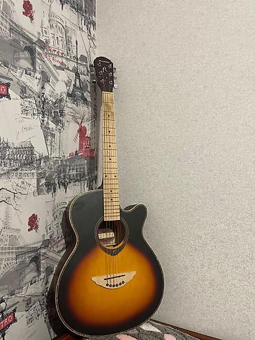 gitara akustik: Kanon akustik gitara.simləri yarsı jılkadı.qiyməti 100 azn.ciddi — 1