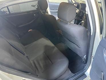 Toyota: Toyota Corolla: 1.4 l | 2005 il Universal — 15