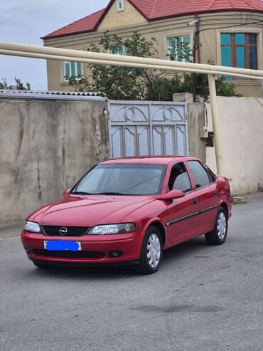 eylec: Opel Vectra sedan – qırmızı rəngli, 4 qapılı, şəhər və magistral üçün