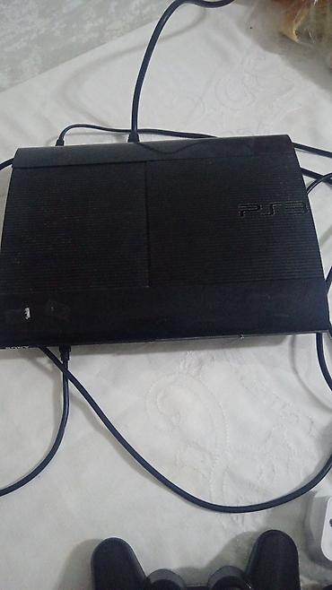 plesteysn 3: PlayStation 3 Super Slim oyun konsolu - Model: PS3 Super Slim (üstdən — 2