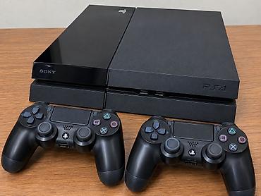 ps4 sükan: Sony PlayStation 4 (PS4) oyun konsolu + 2 ədəd DualShock 4 oyun pulti — 1