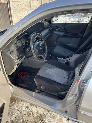 Mazda: Mazda 323: 2003 г., 1.6 л, Бензин, Универсал — 19