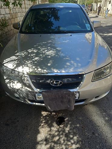 Hyundai: Hyundai Sonata sedan – gümüşü rəng, 5 qapı, ön çəkişli. Texniki və — 4
