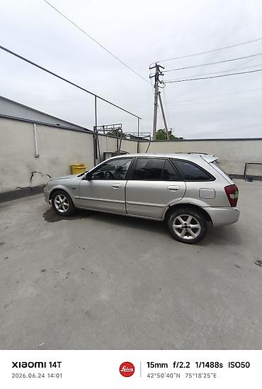 e53 amg: Mazda Familia: 2001 г., Универсал — 1