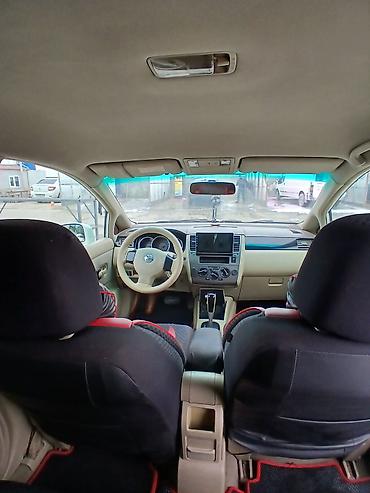 4 ayaq: Nissan Tiida: 1.6 l | 2006 il Sedan — 6