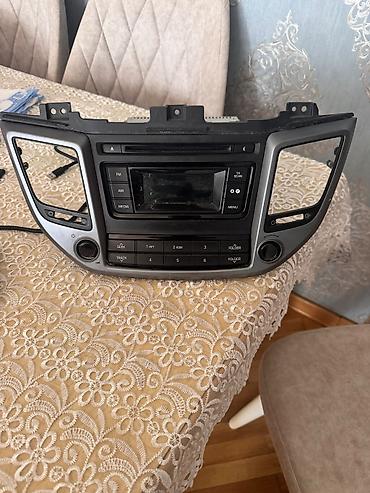 dinami: Hyundai ix35/Tucson üçün orijinal mərkəzi konsol multimedia/radio blok — 1