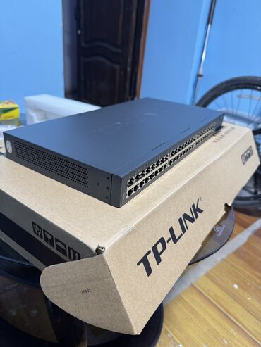 Модемы и сетевое оборудование: Коммутатор TP-Link TL-SG3452, 19-дюймовый стоечный, 48 портов