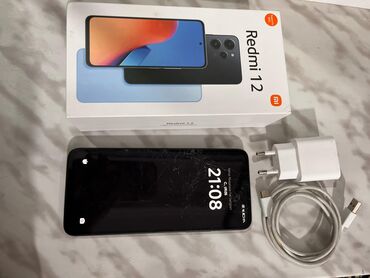 xiaomi redmi 2 red: Xiaomi 12, 256 GB, rəng - Qara, 
 Zəmanət, Barmaq izi, Simsiz şarj