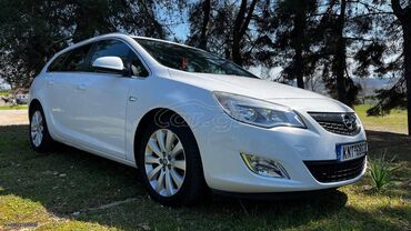 Opel Astra: 1.3 l | 2013 year 100000 km. MPV