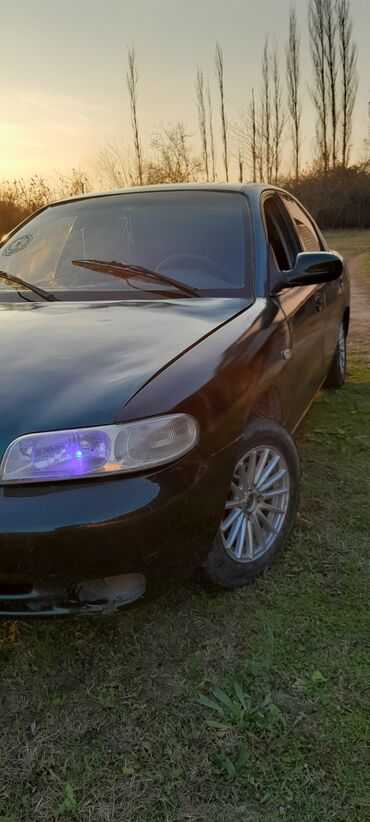 Daewoo: Model: Daewoo Nubira sedan (yaşıl rəng) Kuzov: 4 qapılı, sedan — 11