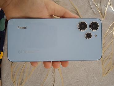 телефон fly f: Redmi 12, 256 ГБ, цвет - Голубой — 1