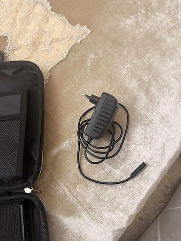 Digər noutbuklar və netbuklar: Microsoft Surface planşet-noutbuk hibridi Xüsusiyyətlər: - Ekran — 12