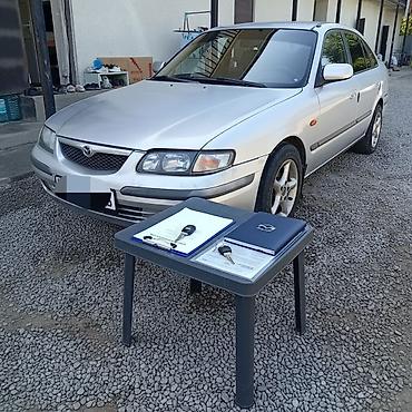 15: Mazda 626: 1998 г., 1.8 л, Механика, Бензин, Хэтчбэк — 4