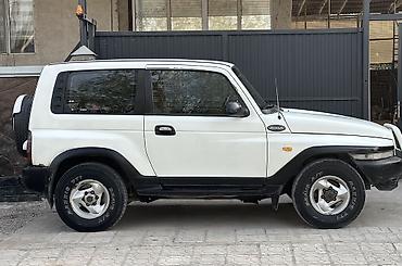 сибирия: Ssangyong Korando: 2001 г., 2.9 л, Механика, Дизель, Внедорожник — 4