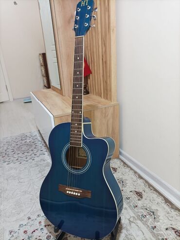 Гитаралар: Срочно продаётся акустическая гитара 40 размер в идеальном состоянии
