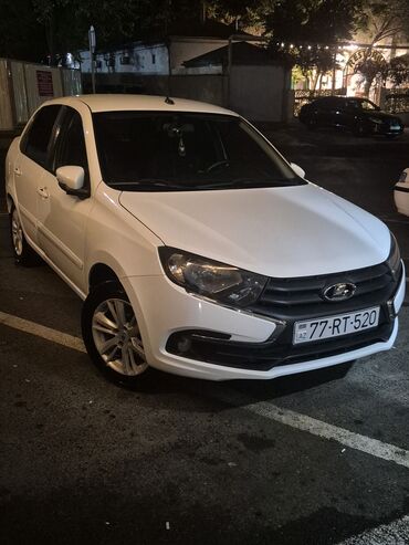 VAZ (LADA): Barter de var Lada Granta modelinin bu ağ rəngli sedanı dörd qapıya və — 10