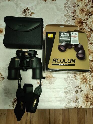 оптика бинокль: Nikon Aculon 8x42 новый Яркое изображение и широкое поле зрения