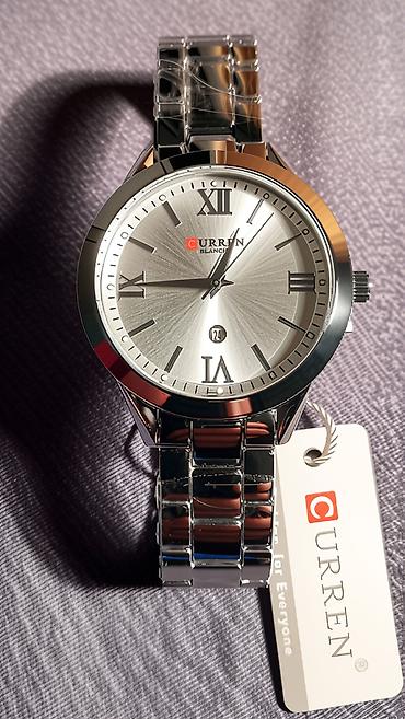 Ručni satovi: Nov ženski sat od nerdjajućeg čelika. Kvarcni mehanizam, ima datum — 9