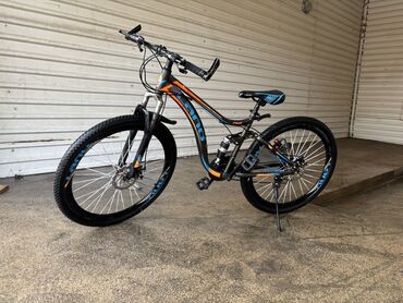 İdman velosipedləri: Ön asqılı, disk əyləcləri və möhkəm çərçivəsi olan dağ velosipedi — 4