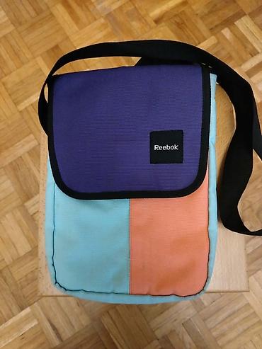 opposite kovin: Reebok uniseks torbica preko ramena – kompaktna i lagana. - Dizajn — 1