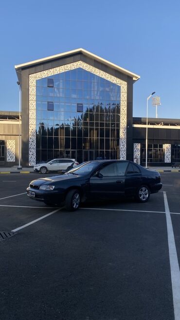 авто заратка: Toyota Carina E: 1997 г., 1.8 л, Механика, Бензин, Седан