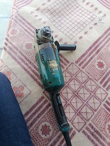 metal cənlər: Makita GA9020 bucaqslifi - Disk diametri: 230 mm - Güc: 2200 W - — 2
