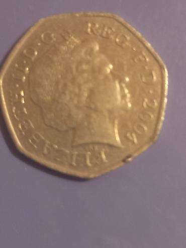 pa 50: Məhsul: Böyük Britaniya 50 pence xatirə sikkəsi Təsvir: - Nominal: 50 — 1