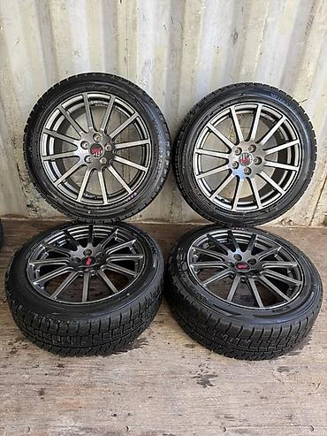 диски r18 subaru: Комплект из 4 колес Subaru STI: оригинальные литые диски с шинами — 1