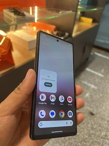 apple studio: Смартфон Google Pixel в белом цвете. Лаконичный фирменный дизайн с — 3