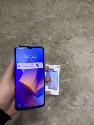 Xiaomi: Xiaomi Redmi 9T, 64 GB, rəng - Göy, 
 Barmaq izi