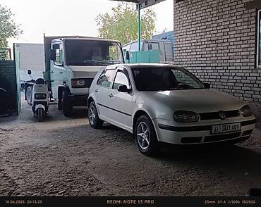 а 210: Volkswagen Golf: 2001 г., Хэтчбэк — 2