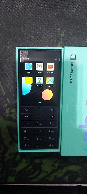mini android telefonlar: DuoQin öğrenci telefonu – düyməli, kompakt və ağıllı funksiyalarla — 1