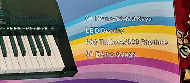 elektro gitarlar: YONGMEI YM-2800 – 61 düyməli elektron sintezator Xüsusiyyətlər: - 61 — 3