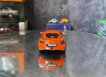 Avtomobil modelləri: Коллекционная модель Opel Speedster orange 2000 DeAgostini Art  — 7