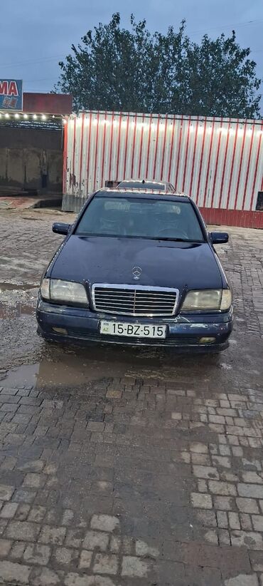 Mercedes-Benz: Mercedes-Benz C 180: 1.8 l | 1994 il Sedan — 12