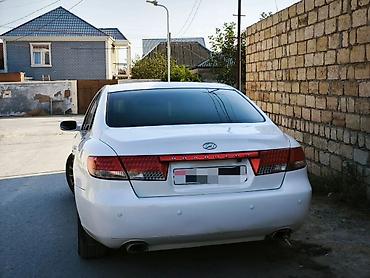 Hyundai: Hyundai Grandeur milvari biznes-sedan. Xüsusiyyətlər və avadanlıq: - — 3