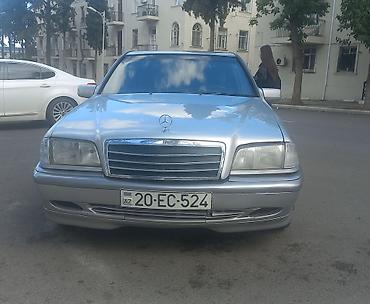 panelerin satisi: Mercedes-Benz C-Sinif sedan (W202), gümüş rəng. - Kuzov: 4 qapılı — 2