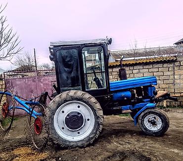 Kənd təsərrüfatı üçün universal tək oxlu traktor. Xüsusiyyətlər: -