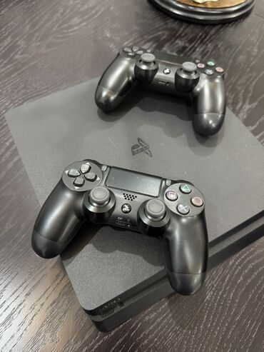 Защитные пленки и стекла: Sony PlayStation 4 Slim oyun konsolu, kompakt dizaynı və iki ədəd