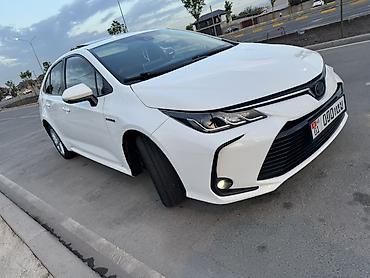 byd e6: Toyota Corolla: 2021 г., 1.8 л, Вариатор, Гибрид, Седан — 4