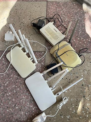tv android box: Wi‑Fi marşrutizatorları və aksesuar dəsti Tərkib: - 2 ədəd Xiaomi Mi — 1